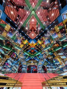 A colorful, modern retail storefront interior with glass walls.