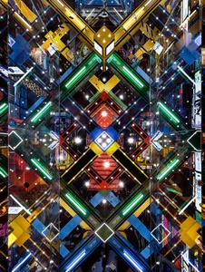 A vibrant, geometric digital illustration featuring multicolored shapes and patterns.