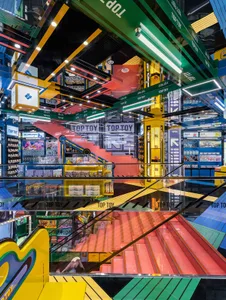 A vibrant, colorful retail space with various merchandise and functional areas.