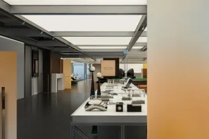 A modern showroom interior featuring sleek, minimalist design elements.