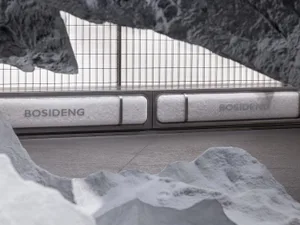 Close-up view of Bosideng retail storefront with fabric display and metal barriers