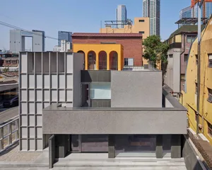 Modern architectural structure with concrete exterior.