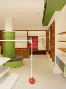 A modern retail shop featuring wooden elements and a colorful interior design.