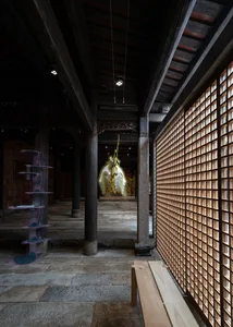 Traditional Japanese interior featuring wooden paneling and traditional decor.
