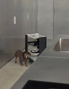A modern, minimalist kitchen with metallic accents, featuring a sleek, industrial design.