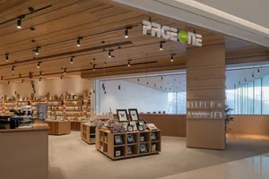 A modern retail space featuring wooden materials and minimalist design.