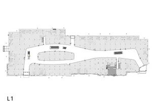 Industrial basement layout plan with offices, storage, and utility rooms.