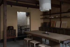 Industrial-style office space with raw materials and minimalistic design.