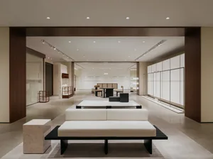 現代展示廳陳列混凝土桌與簡約室內設計。