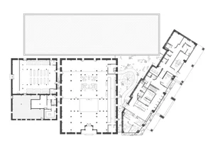A detailed 2D architectural drawing of an office building, showing floor plans and structural elements.