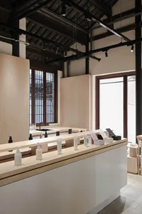 A minimalist spa interior featuring wooden elements.