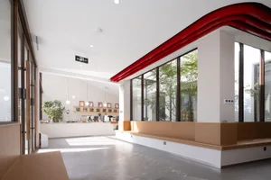 Contemporary cafe interior featuring wooden and glass elements