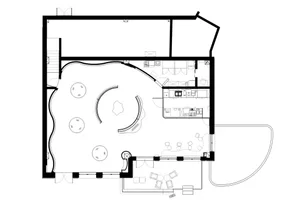 Floor plan of a modern home office with a floating desk and multifunctional space.