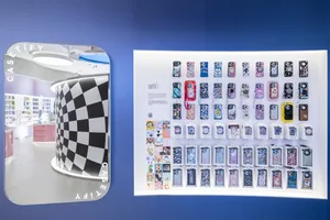 A retail storefront displaying various phone cases in a modern, colorful setting.