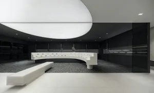 A modern retail store with concrete, glass, and metal finishes.