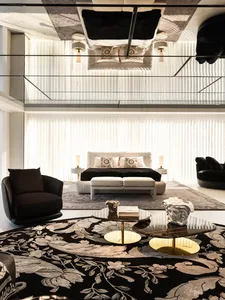 Modern living room featuring textured sculptures and leather upholstery
