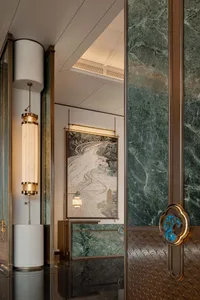 Modern indoor reception desk featuring marble materials.