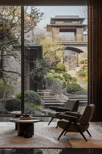 An elegant and modern residential interior featuring warm wood, stone, and glass finishes.