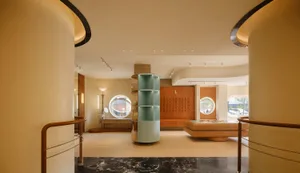 A modern retail space featuring marble and glass elements.