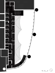 Floor plan of a modern office layout with mixed materials and geometric shapes.