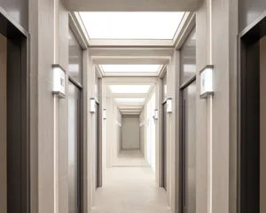 Modern, minimalist corridor with concrete walls and stairs