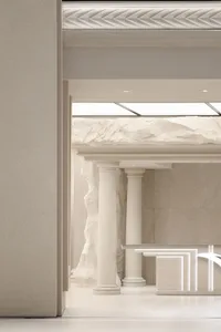 A modern living space with concrete walls and a minimalist design.