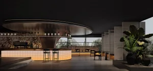 A modern coffee shop interior with industrial aesthetic, featuring a curved counter, bar stools, and potted plants.