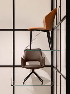 Industrial-style furniture design with brown leather upholstery and metal legs.