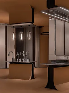 Modern industrial kitchen featuring metal and glass materials and sleek design elements.