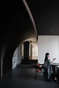 A modern interior design featuring black and white color scheme