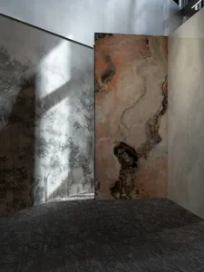 A modern interior design featuring marble panels with artistic patterns.