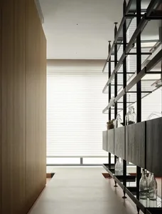 Modern residential kitchen with glass shelves.