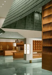 A traditional Japanese interior designed with modern commentary on wood and bamboo materials.