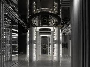 A modern commercial space featuring metal and glass elements.