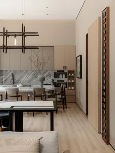 Modern kitchen featuring a marble countertop with a minimalist design aesthetic.