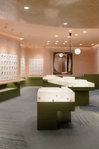 A minimalist retail store featuring a modern design with terrazzo flooring.