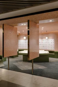A modern jewelry shop featuring contemporary designs with a terrazzo floor and open display cases.