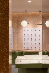 Interiors of a retail storefront featuring a concrete and terrazzo design.
