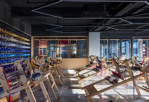 Industrial weaving looms in a textile production factory