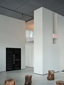 A minimalist commercial interior designed with concrete elements