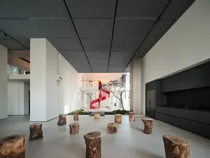 A modern lobby featuring a concrete finish.