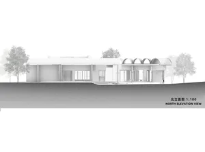Modern exterior architectural design featuring steel, glass, and concrete materials.