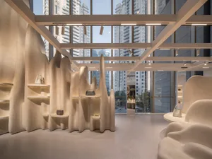 Modern retail display featuring sculptural concrete structures