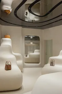 A modern retail shop featuring geometric concrete shapes and minimalist design.