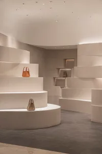 A minimalist space featuring concrete elements, designed for contemporary aesthetics.