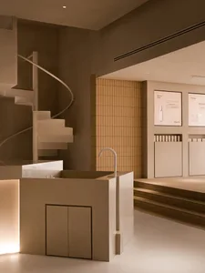 A modern retail space featuring concrete elements and minimalist design