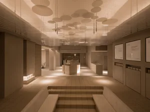 Industrial brick storefront with concrete elements and a minimalist design.