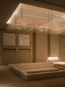 Modern spa room with concrete walls and tiled floor
