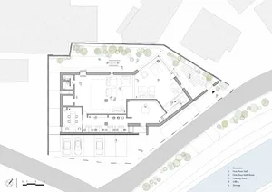 Detailed architectural blueprint of a modern office space featuring concrete and glass elements.