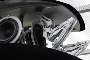 Detailed metal speakers integrated into a sound system design